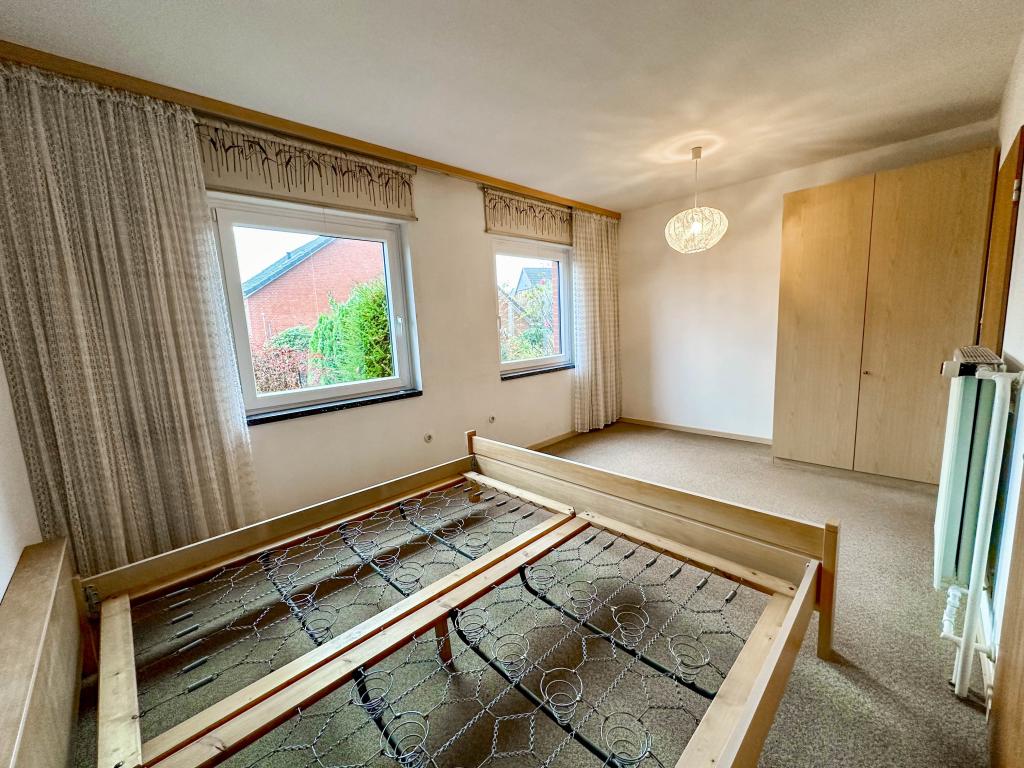 Einfamilienhaus: Schlafzimmer 1